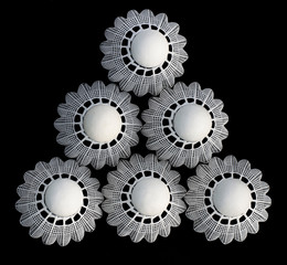 plastic  Badminton shuttlecock set isolated on the black background. Design of a shuttlecock. Badminton accessories. Sports equipment. place for text