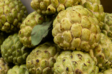 Custard apple fruits, Annona reticulata, are on display for sale at New Market area, Kolkata, West Bengal, India.