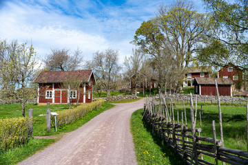 Fototapeta na wymiar Asens By in Swedish idyllic Smaland. A Small Rural farmland village preserved as a Cultural nature Reserve. 