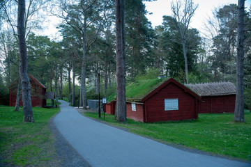 Jonkoping City Park in Jonkoping municipality Sweden, With small animal enclosures and wooden red houses.