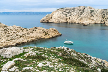 Small boat near the coast of Ratonneau island, part of Frioul archipelago, Marseille, France