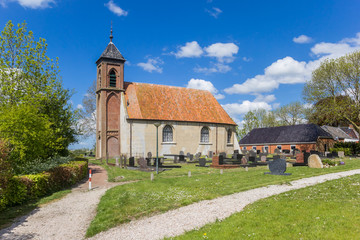 Fototapeta na wymiar Historic church in the small village of Dorkwerd, Netherlands