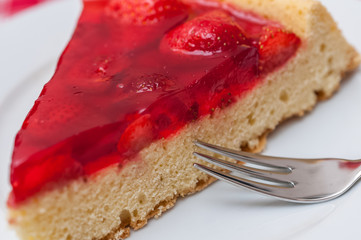 Portion of strawberry tart on a plate