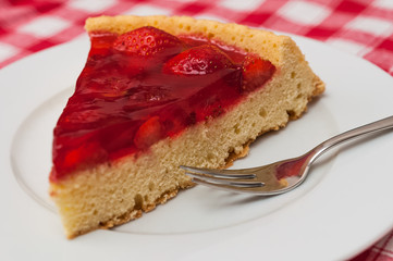 Portion of strawberry tart on a plate