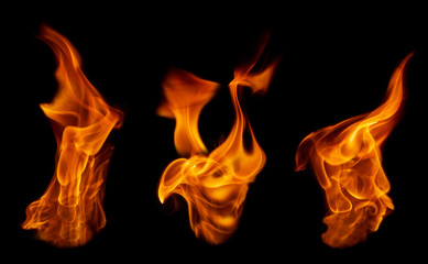 Fototapeta premium A texture of fire dancing in the dark, having a different shape.