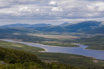Naklejka na ściany i meble Landscape from the hill in Magadan