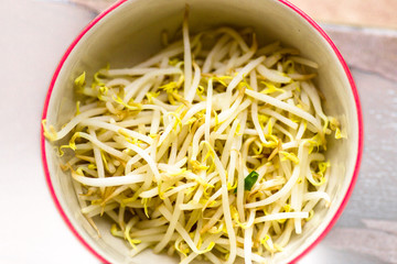Background of healthy vegetables (bean sprouts) that are put in a clean cup container, to be used as part of the food (noodle soup)