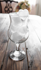 glass of ice in the form of a cold heart