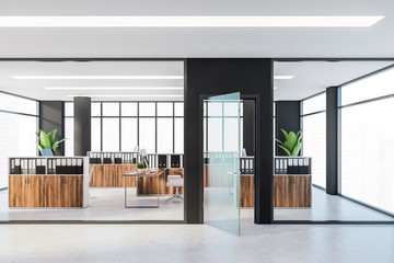 Fototapeta premium Black and wooden office interior with cubicles