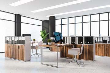 Panoramic black and wooden office with cubicles