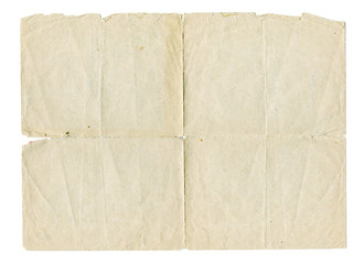 Vintage light paper blank with torn edges isolated on white background. Old paper texture for design.