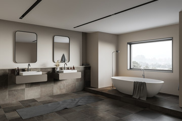 Beige and tiled bathroom corner