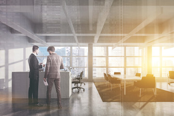 Managers talking in white office with meeting room