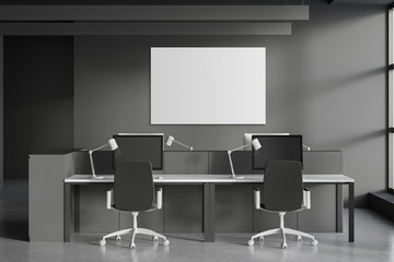 Gray open space office with horizontal poster