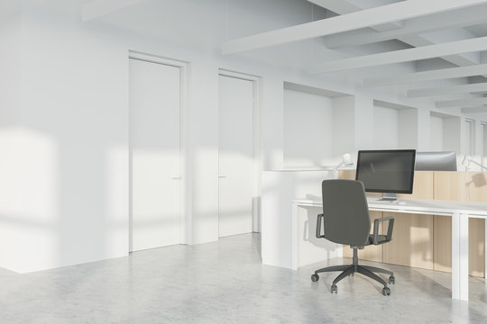 Workplace in white and wooden office corner