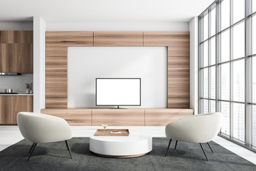 White living room with mock up TV and armchairs