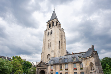 Fototapeta na wymiar The Church of Saint Germain des Pres in Paris. Cloudy Sky.