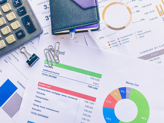 Fototapeta premium analytics graph and pie chart on many paperwork and statistical. business workplace and finance concept.