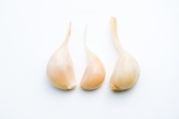 Sugar garlic on the white table.