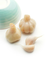 Sugar garlic on the white table.