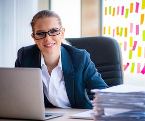 Beautiful female employee with many conflicting priorities