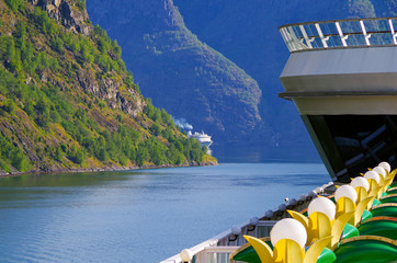 Cruiseship or cruise ship liner in Flam, Norway during cruising to Norwegian Fjords in...