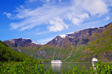 Cruiseship or cruise ship liner in Flam, Norway during cruising to Norwegian Fjords in...