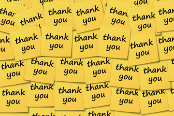 Yellow post it note paper with thank you message