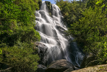 Scenic waterfall in tropical Atlantic forest, motion blur, Serra da Mantiqueira, Brazil
