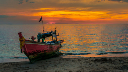 Fishing boat parked on the beach