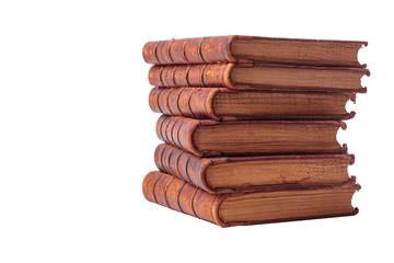 A stack of old books bound in brown leather, isolated on a white background. Space for text