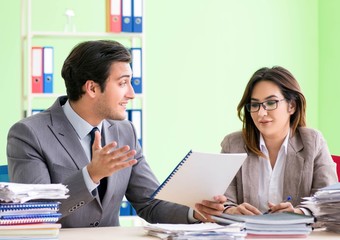 Two colleagues working in the office