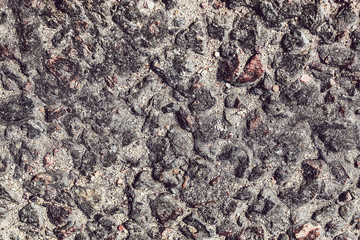 Solid granite stones lying on the sand road highway where passing cars. Road works. color, decoration, design, empty, gravel