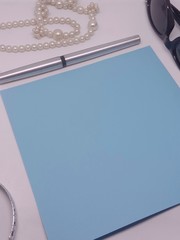 Blue paper and accessories and space for putting text