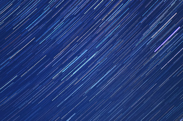abstract stars trails blue background