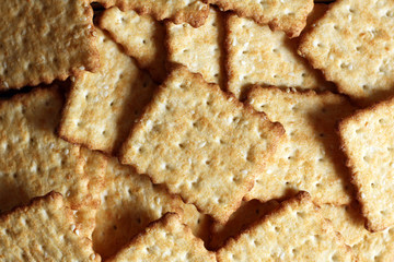 Time to drink tea and coffee break. A lot of square cookies with sesame seeds.