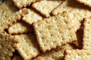 Time to drink tea and coffee break. A lot of square cookies with sesame seeds.
