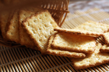 Time to drink tea and coffee break. A lot of square cookies with sesame seeds.