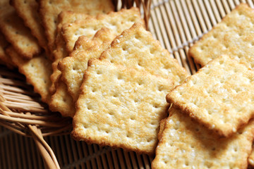 Time to drink tea and coffee break. A lot of square cookies with sesame seeds.