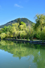 New Athos, Abkhazia. Pond and city park in sunny August day