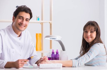 Hands during manicure care session