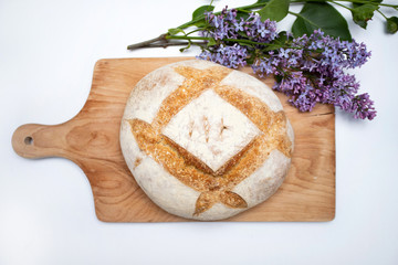 Traditional bread on wooden table.