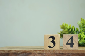 Number 34, Rating, Award, Design with number cube colorful stone in natural concept.