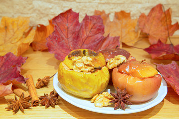 Tasty baked homemade apples, close up. Delicious healthy autumn dessert.