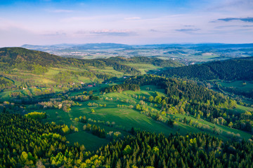 Rudawy Janowickie Landscape Park Aerial View. Mountain range in Sudetes in Poland view with green forests and landscape. - obrazy, fototapety, plakaty