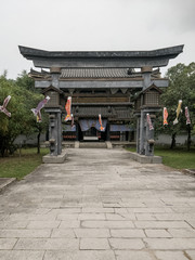 asian japanese temple shrine gateway with fish carp flags