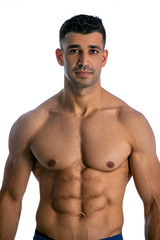 Fototapeta premium Fit young man with beautiful torso, isolated on white background