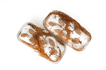 Baked sourdough rye flour bread isolated on white background
