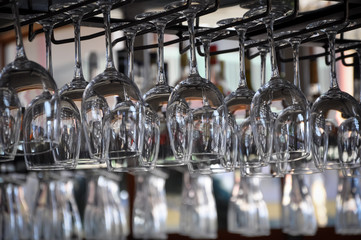Wine glasses hanging upside down