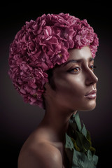 Beautiful woman with flowers head beauty